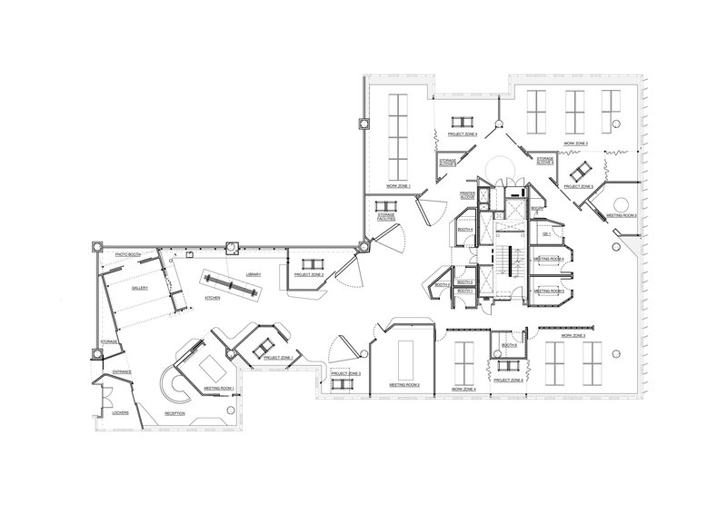 Floor plan drawing showing angled rooms and workspaces organized around a central circulation core