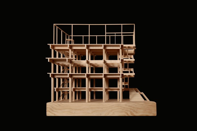 Front elevation of the timber frame model displaying column grid and arched openings