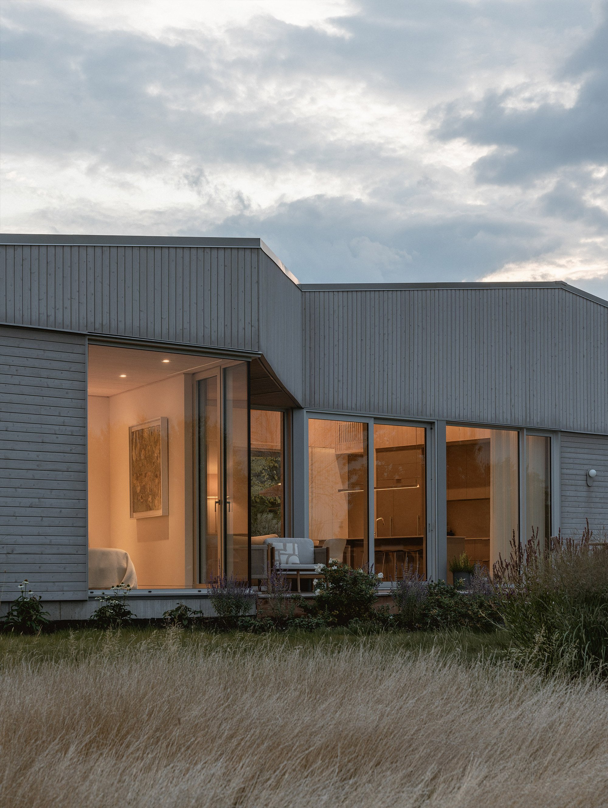 NatureHumaine Splits a Country Retreat into Two Gabled Volumes on a Quebec Meadow