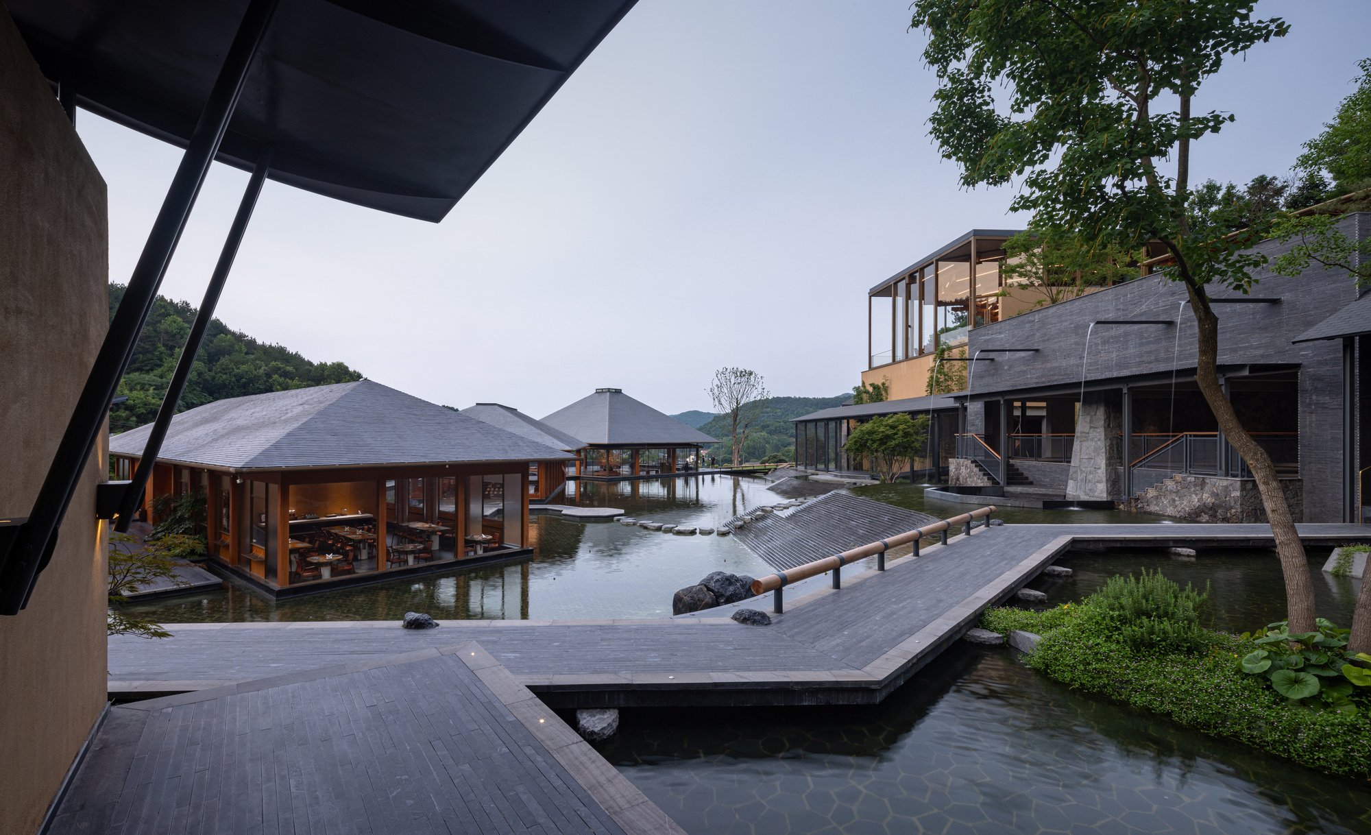 Atelier LAI Scatters a Timber Resort Across a Terraced Anhui Valley
