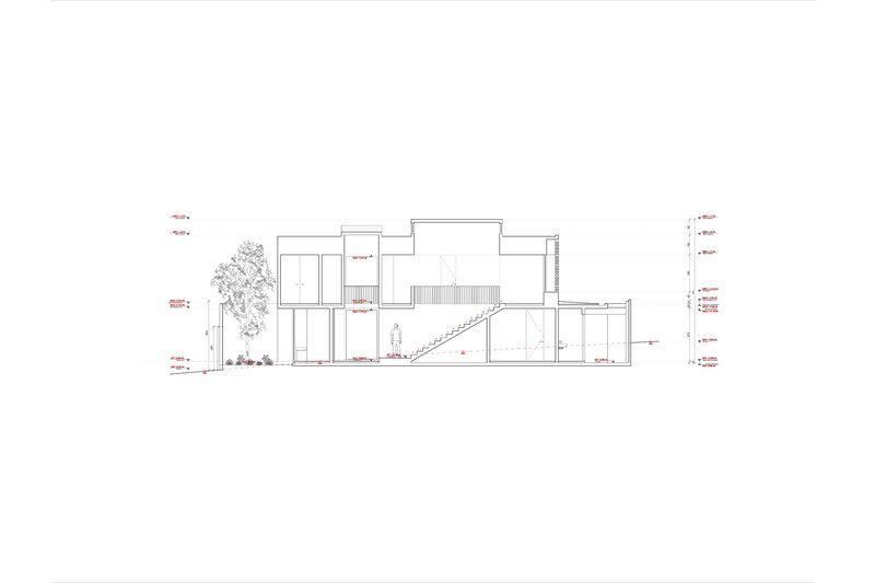 Section drawing revealing interior spatial connections with an external staircase and planted areas