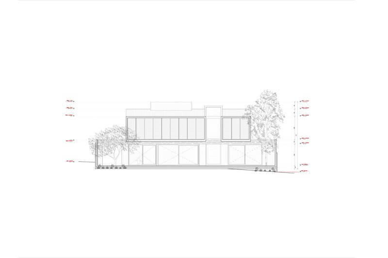 Elevation drawing depicting two-story glazed facade with adjacent trees and annotation labels