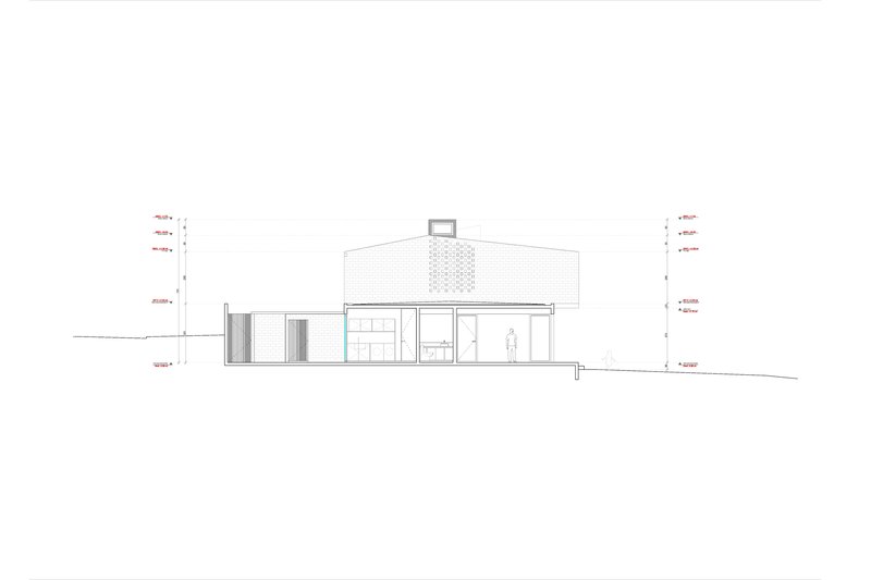 Elevation drawing showing sloped site with perforated brick volume and garage opening