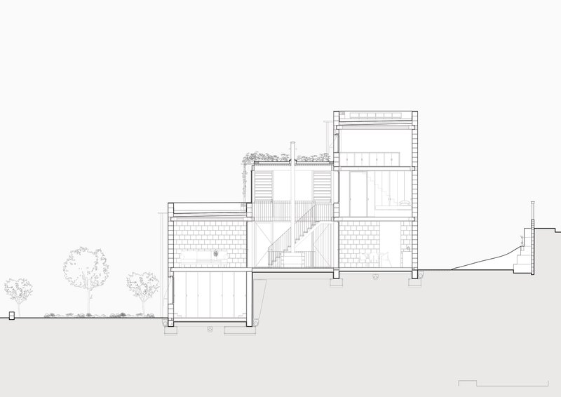 Section drawing showing a multi-level residence with staircase, brick walls, and rooftop planting alongside adjacent trees