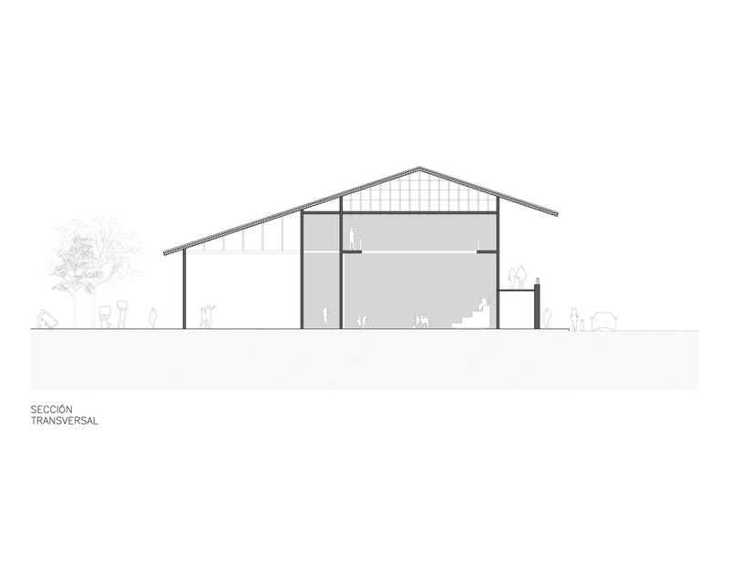Cross-section drawing through a gabled warehouse structure with mezzanine and figures for scale