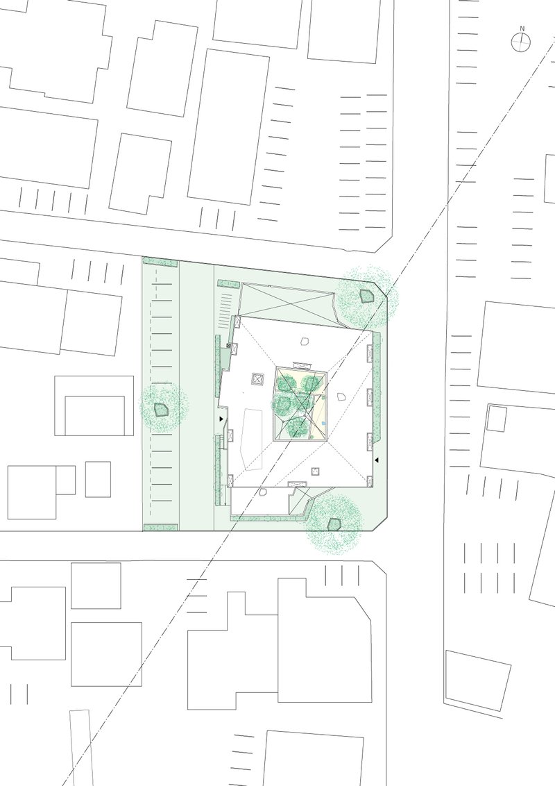 Site plan drawing showing a corner lot with central courtyard and surrounding planted zones and street parking