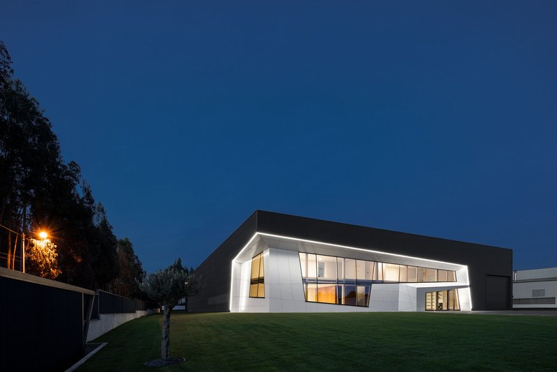 Sharp roofline and angled envelope emphasizing a futuristic architectural language.