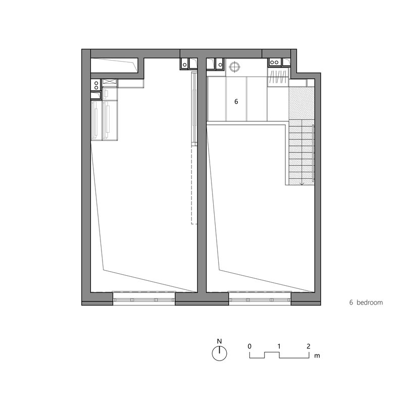 Floor plan showing a bedroom level with ensuite and staircase