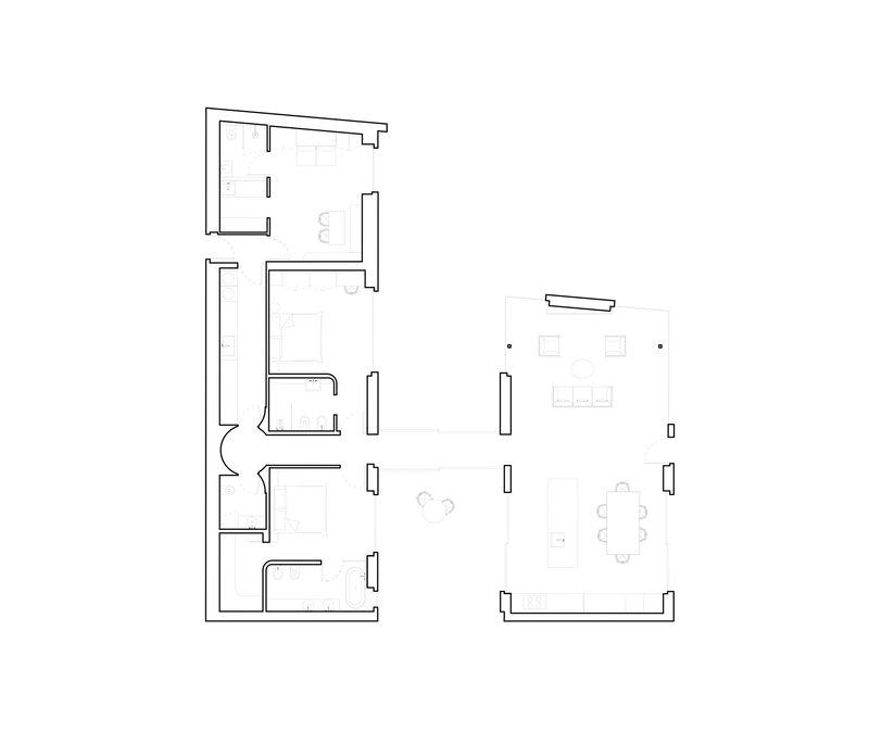 Floor plan drawing showing residential layout with bedrooms on left and open living area on right