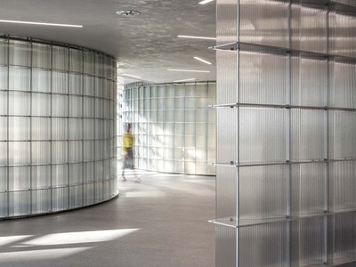 HCCH Studio Wraps a Shanghai High-Rise Office in Curved Walls of Translucent Glass