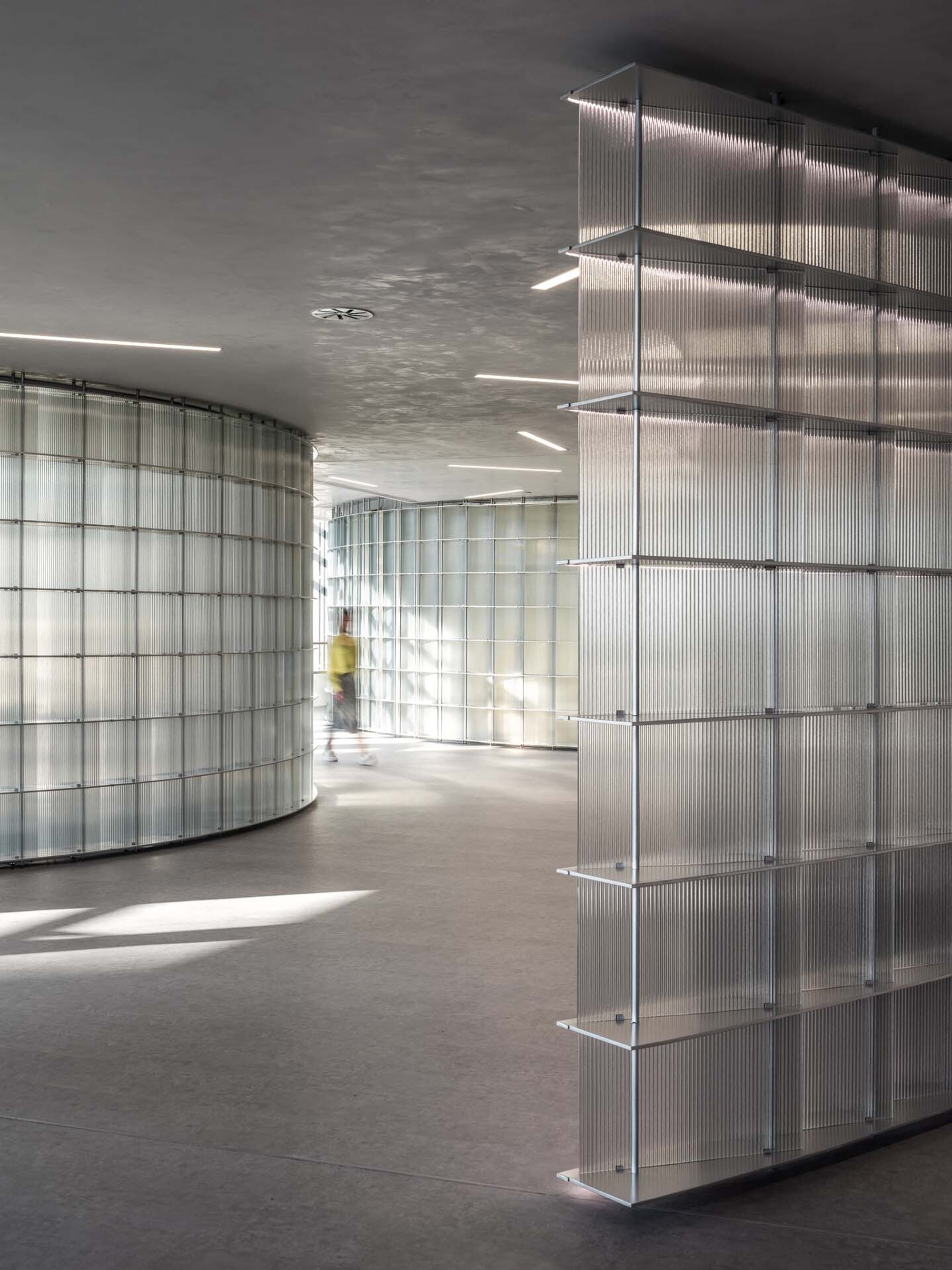 HCCH Studio Wraps a Shanghai High-Rise Office in Curved Walls of Translucent Glass