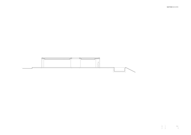Section drawing depicting a low-slung structure with flat roof planes stepping down a sloped site