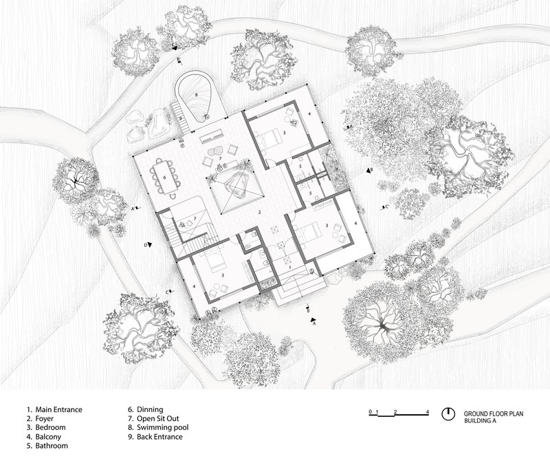 Ground floor plan drawing with rooms arranged around a central courtyard and landscaping with circular tree canopies