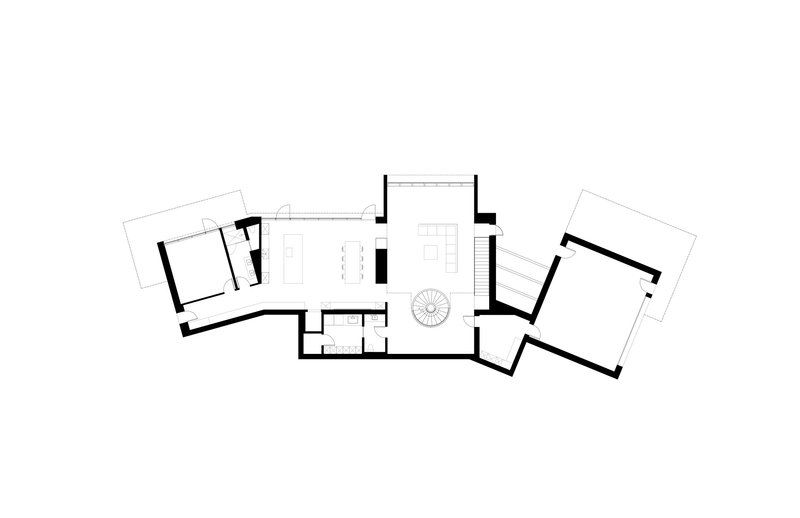 Floor plan drawing depicting the main living level with kitchen, dining area and spiral stair