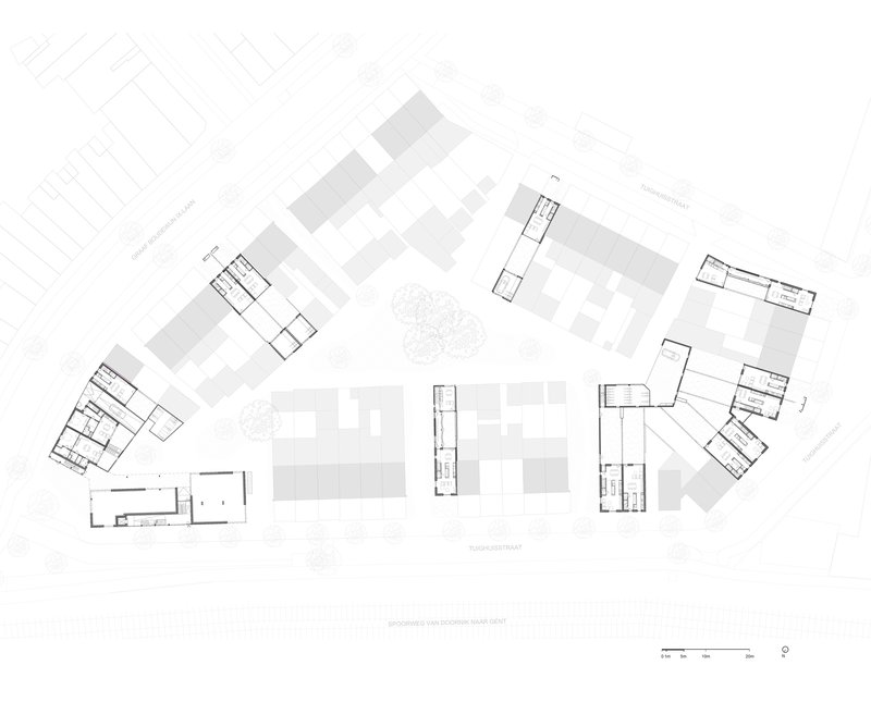 Site plan drawing showing multiple building volumes arranged around a central courtyard with a tree