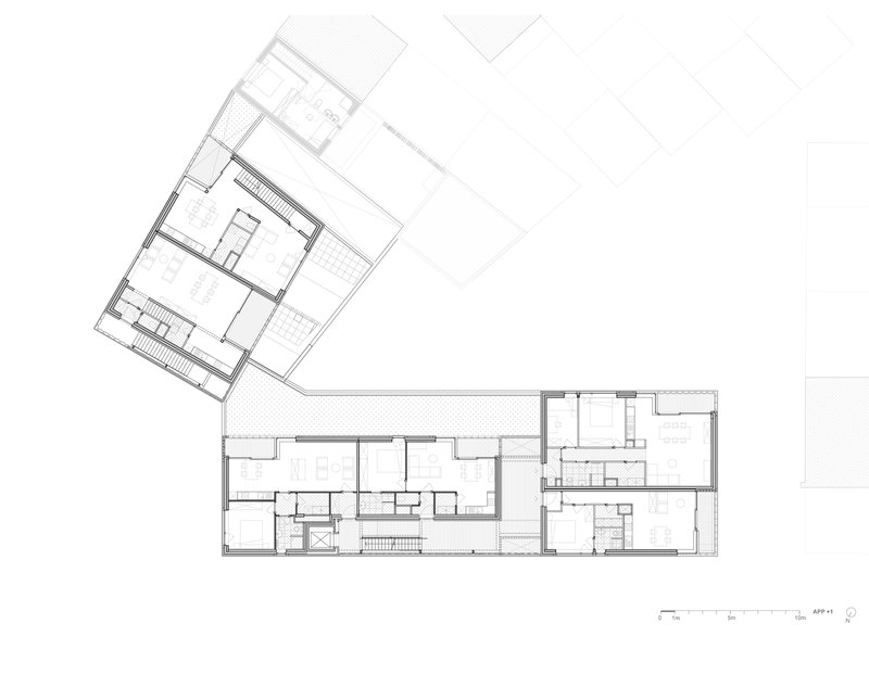 Floor plan showing L-shaped volumes connecting around a courtyard with gridded paving
