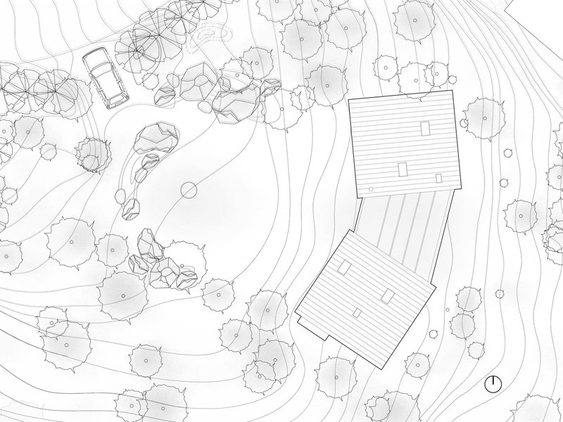 Site plan drawing showing two angled volumes among contour lines and tree canopies