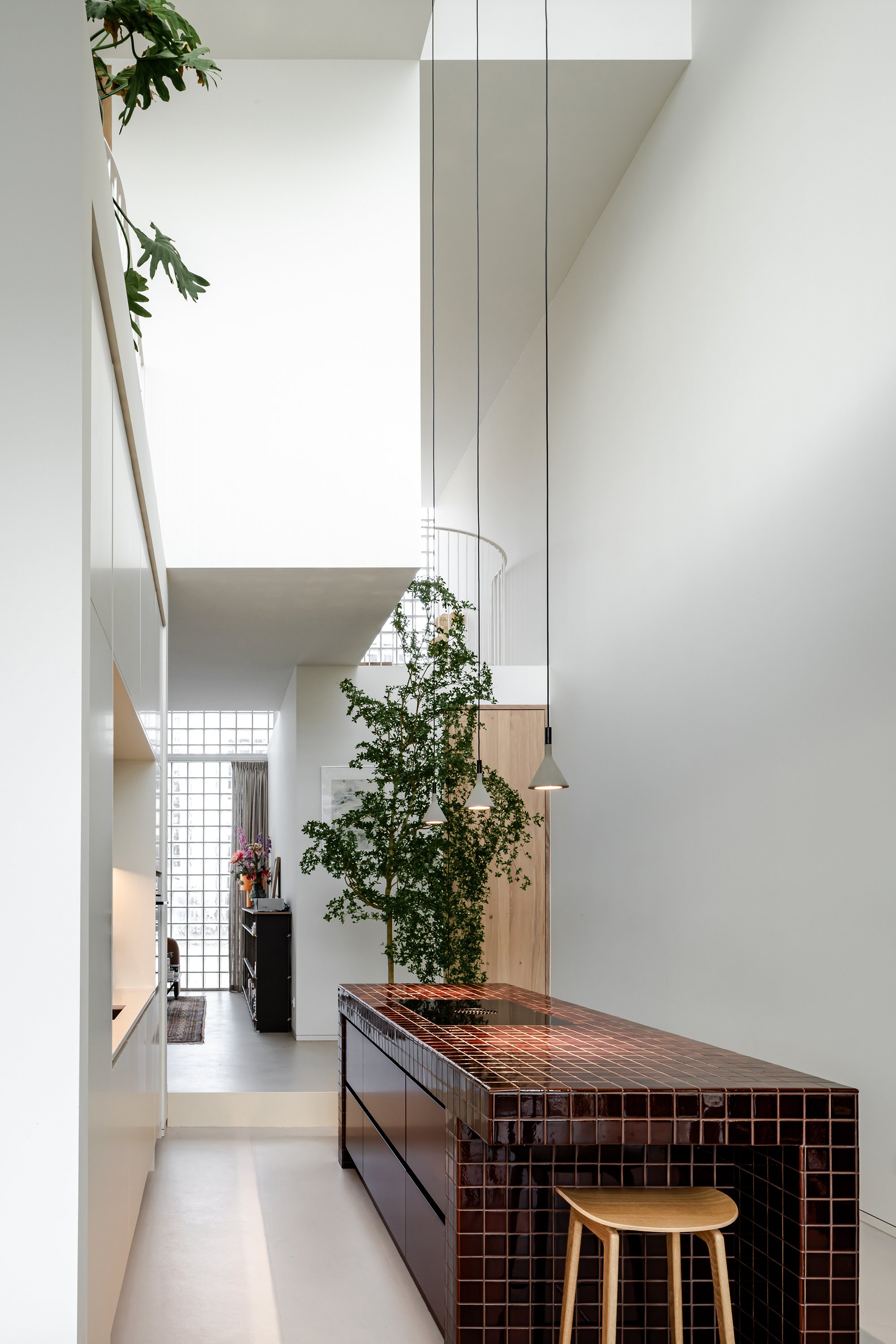 Studioninedots Stacks Five Luminous Boxes into a Vertical Family Home on Amsterdam's Newest Island