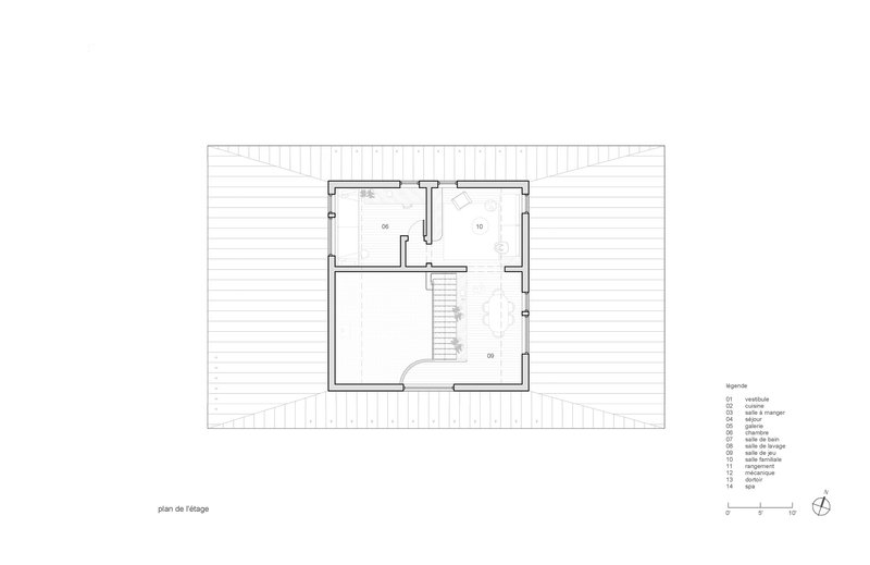 Attic floor plan drawing showing two small rooms and a central stairwell beneath a pitched roof