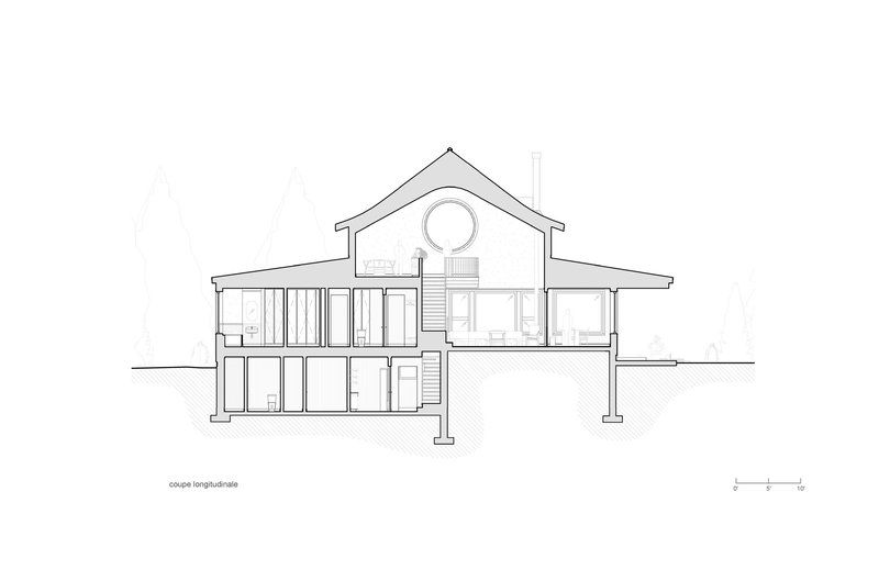 Longitudinal section drawing showing a two-story house with gabled roof and circular window detail