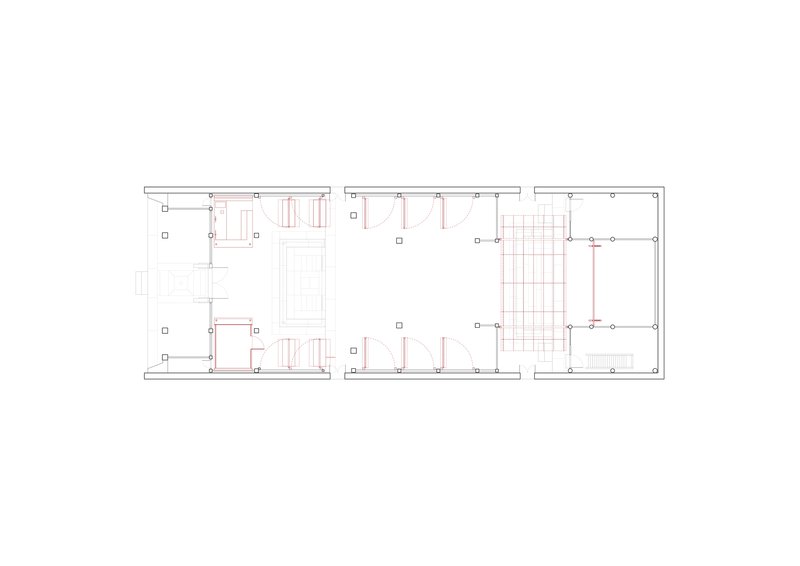 Floor plan drawing showing three connected volumes with room divisions and structural grid