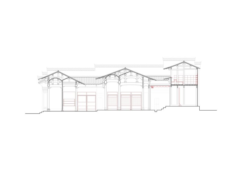 Section drawing revealing pitched roof structures with timber trusses and varying ceiling heights