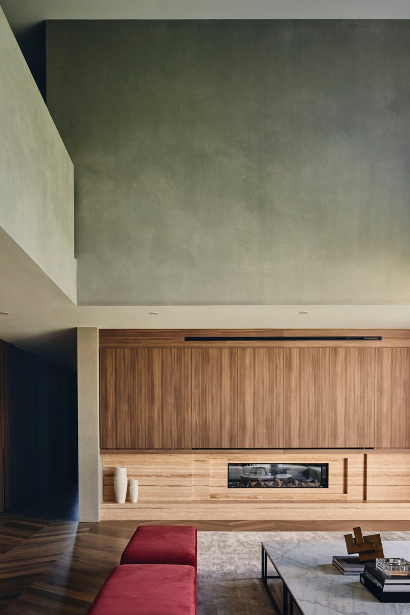Living room with horizontal timber joinery and polished concrete ceiling