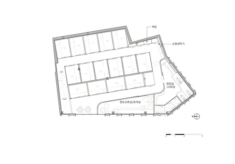 Floor plan drawing depicting similar layout with angled site boundary and interior divisions