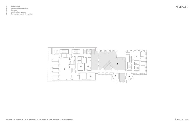 Second level floor plan showing two linked wings with office spaces and corridors