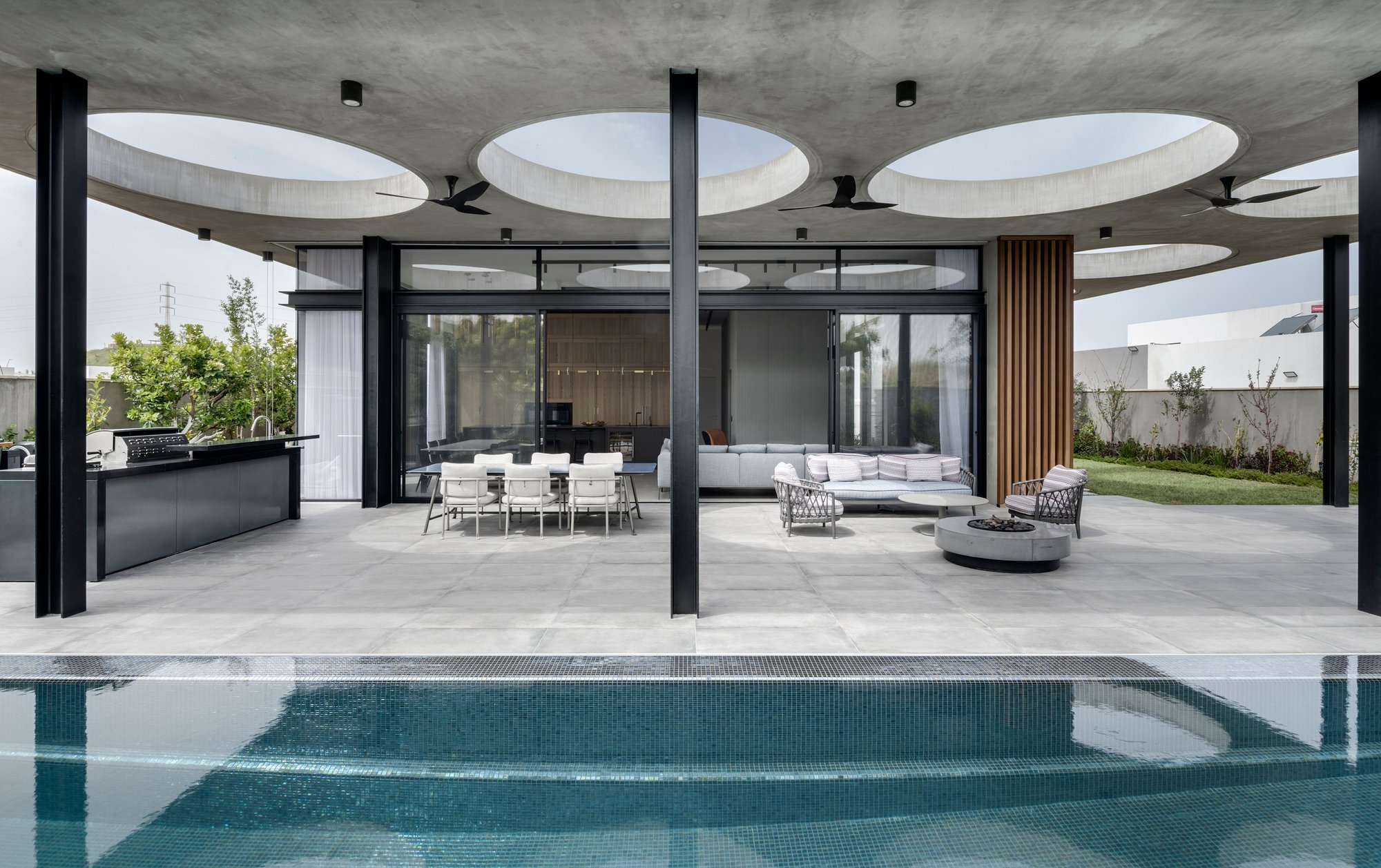 Dan and Hila Israelevitz Lay a Concrete and Timber House into an Israeli Hillside