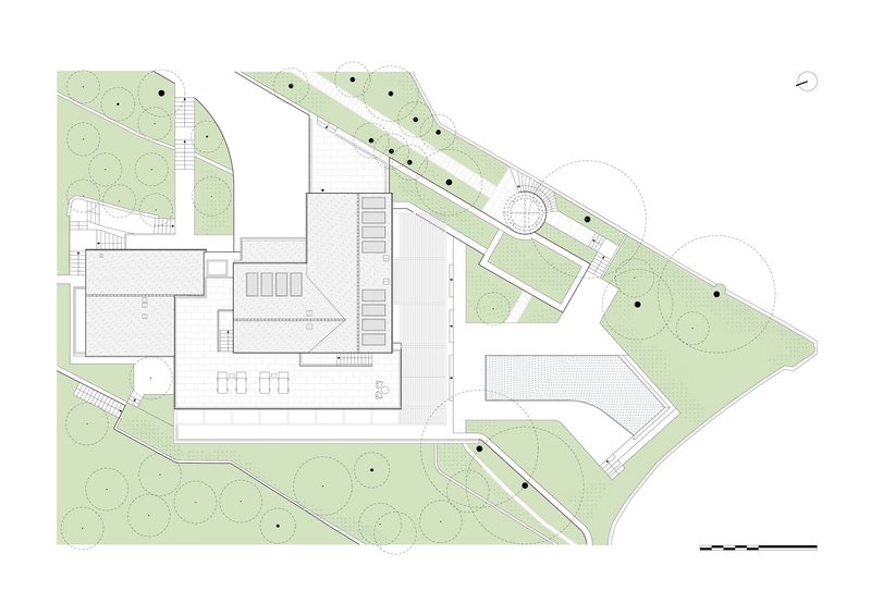 Roof plan drawing showing terrace areas with diagonal pathways and surrounding landscape zones