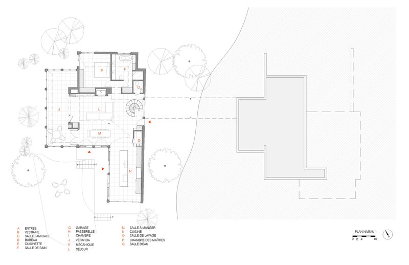 Floor plan drawing showing the main level with living spaces, kitchen and bedrooms arranged in an L-shape