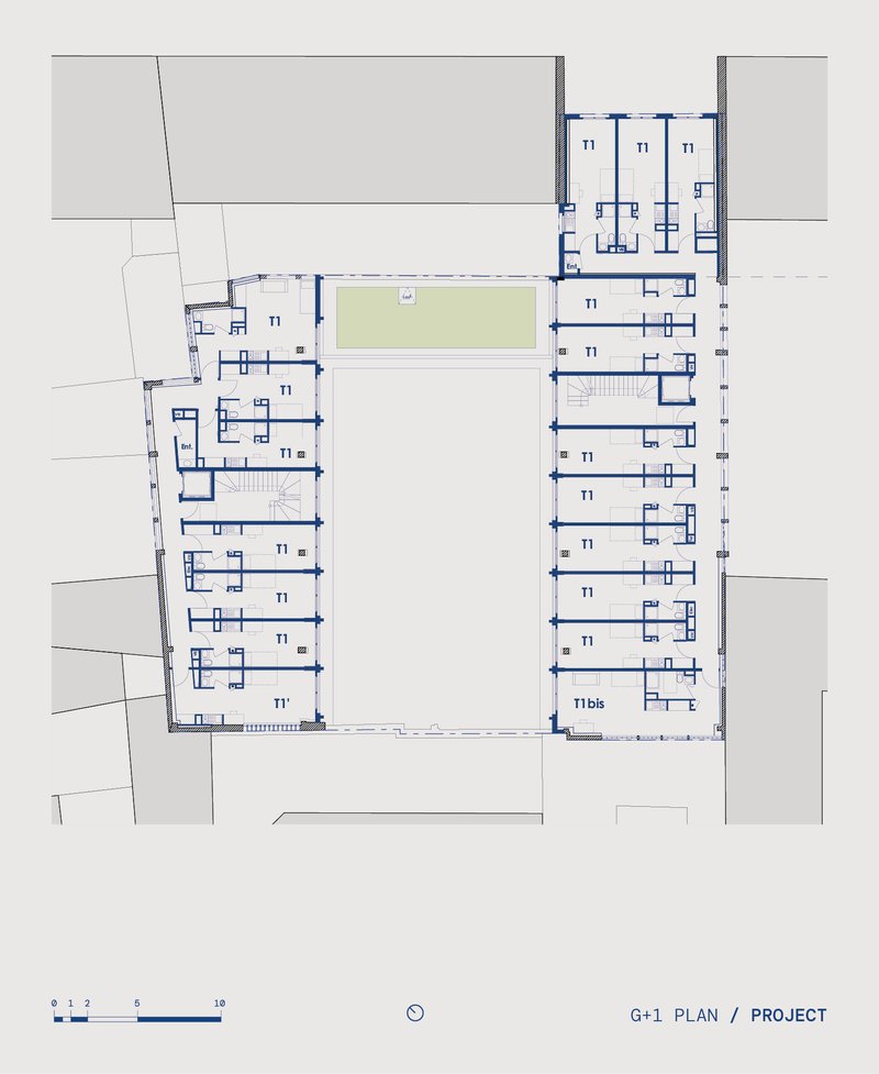 Upper level plan showing residential units wrapping three sides of a central courtyard space