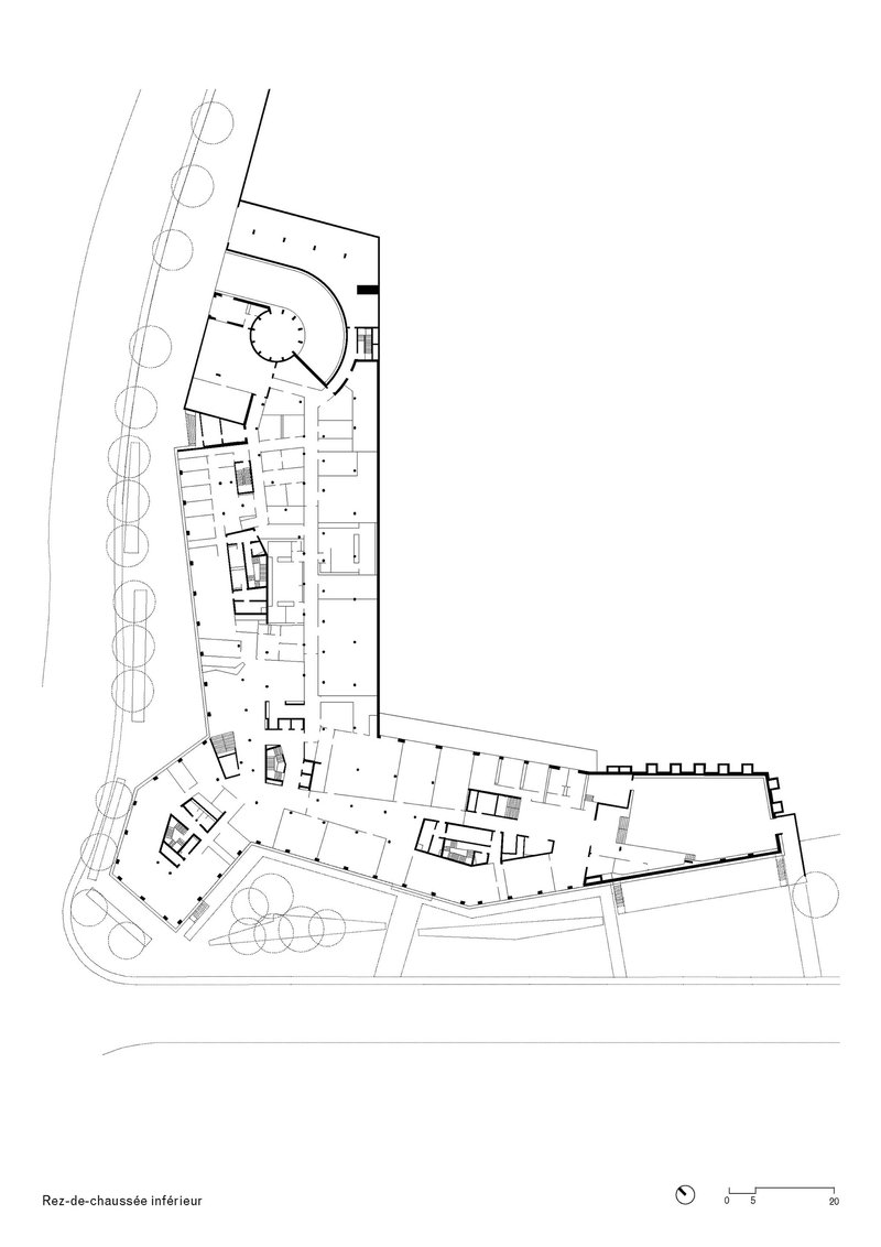 Ground floor plan drawing showing an angled three-winged building layout with surrounding landscaping