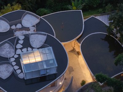 Archermit Scatters Five Concrete Petals Across a Chinese Hillside to Form the Feixue Pavilion