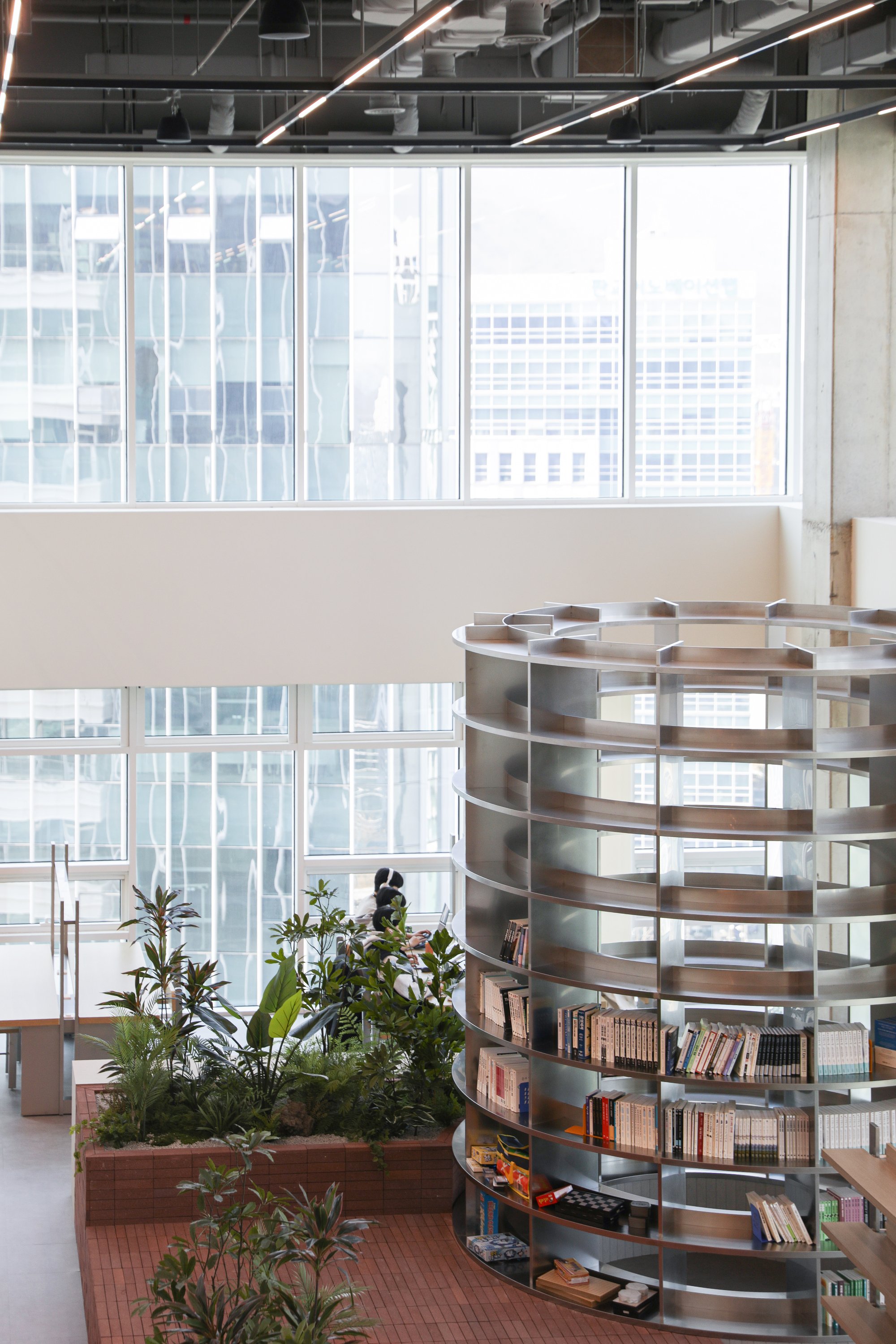 unseenbird Fills a Pangyo Tech Office with Red Brick, Greenery, and Communal Wellsides