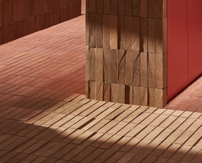 This architectural image showcases a close-up of brickwork, emphasizing texture and geometric patter