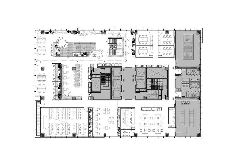 Floor plan drawing showing terraced outdoor area and reconfigured workspaces with central cores