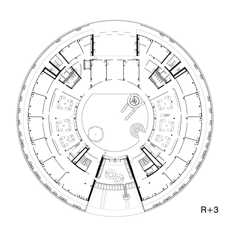 Floor plan drawing showing circular layout with perimeter workspaces surrounding a central core