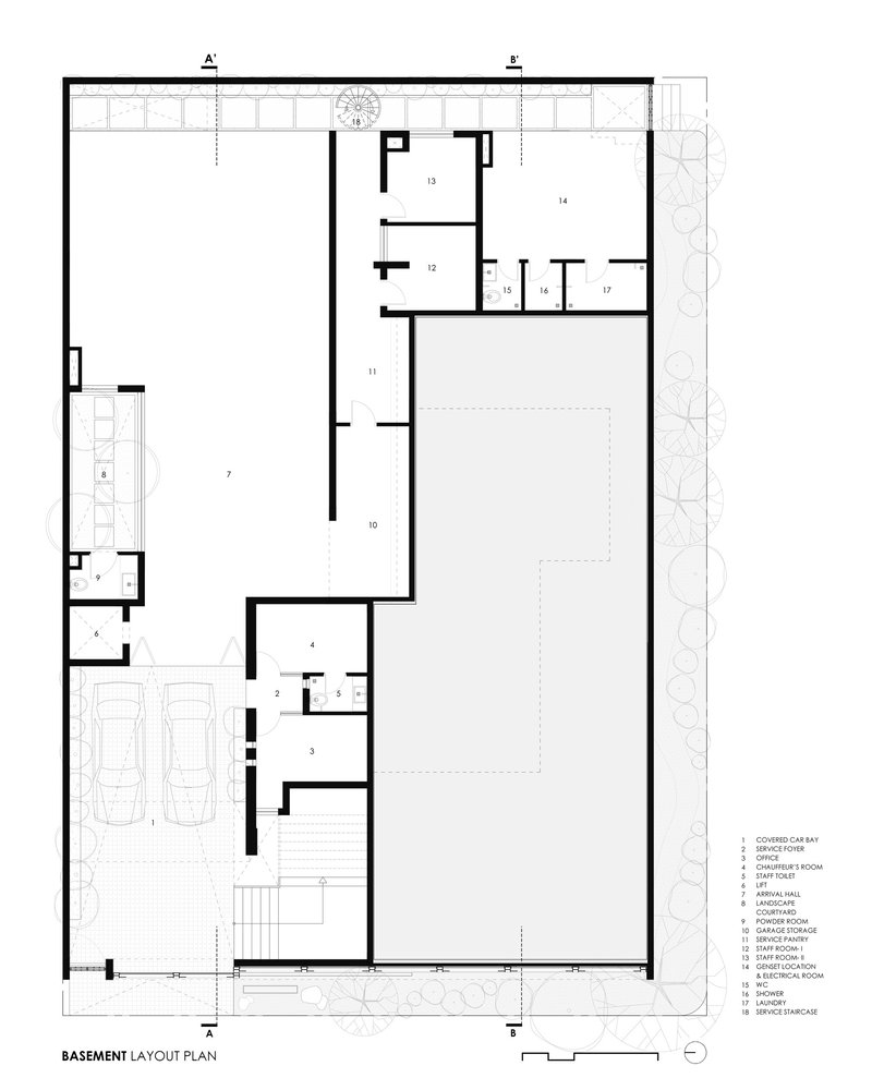 Basement plan drawing showing garage with two cars, service spaces and a large open recreation area