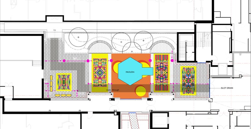 Floor plan drawing showing a central courtyard with colorful geometric artworks and circular planters