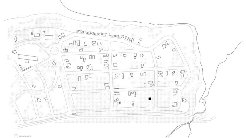 Site plan drawing showing building footprints and landscape layout across an irregular terrain