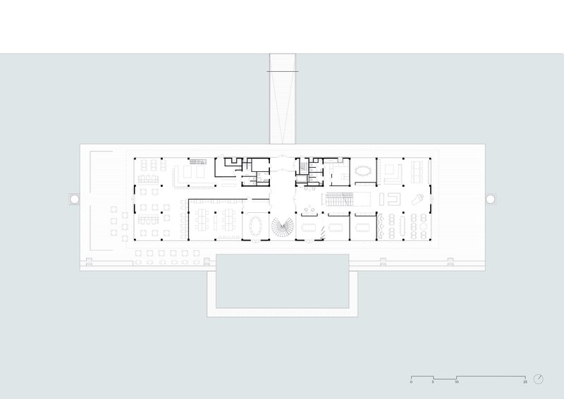 Ground floor plan drawing showing elongated rectangular layout with central courtyard and surrounding workspaces