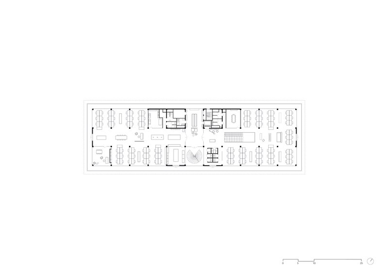 Upper floor plan drawing depicting open-plan workspace with central circular feature and perimeter offices