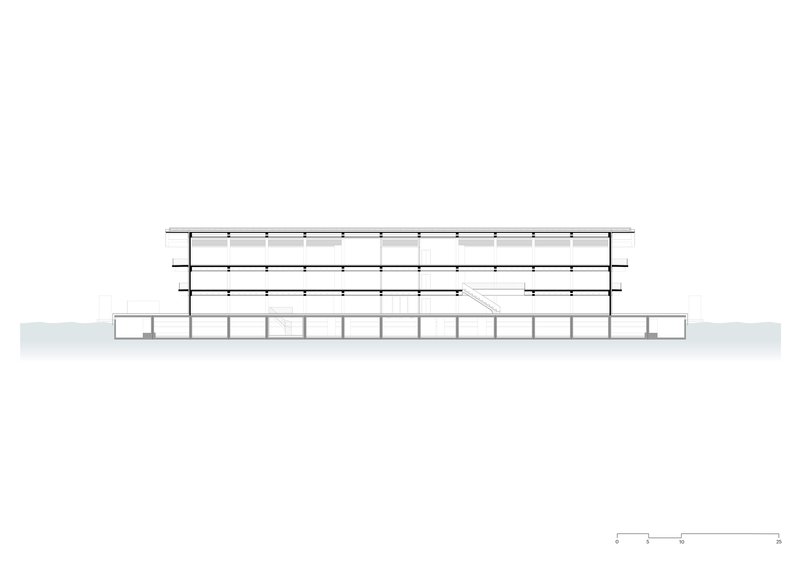 Section drawing showing three-story horizontal building with cantilevered upper floors and ground-level colonnade