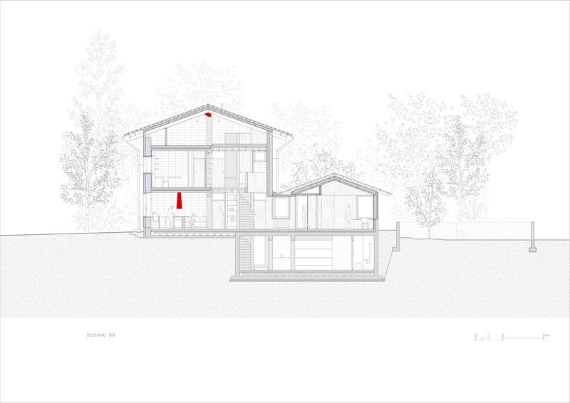 Building section drawing showing two gabled volumes at different heights with exposed staircases and red elements