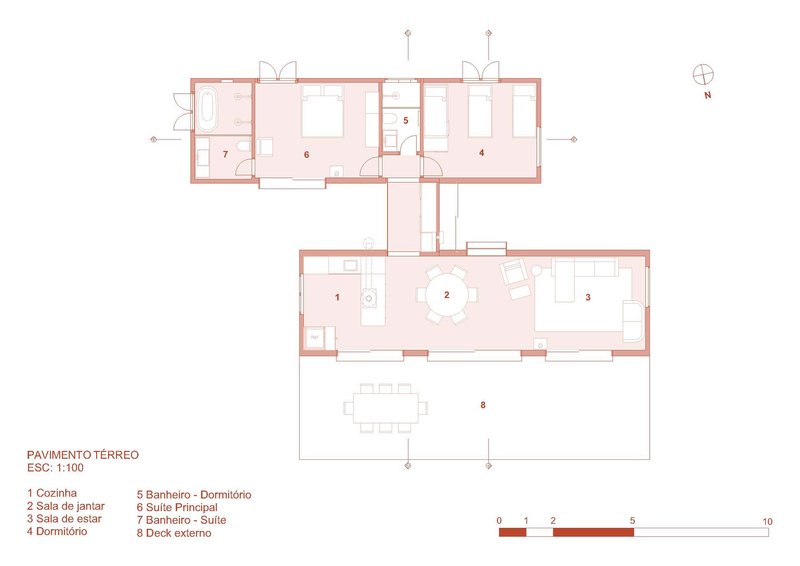 Floor plan drawing showing two linear wings connected by a central circulation spine with rooms and deck