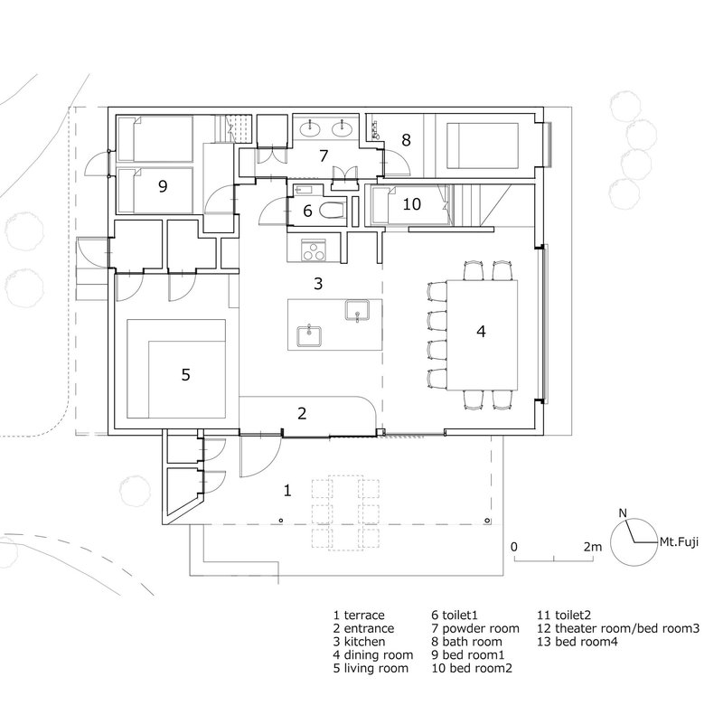 Floor plan drawing showing the main level with kitchen, dining room, living room and three bedrooms