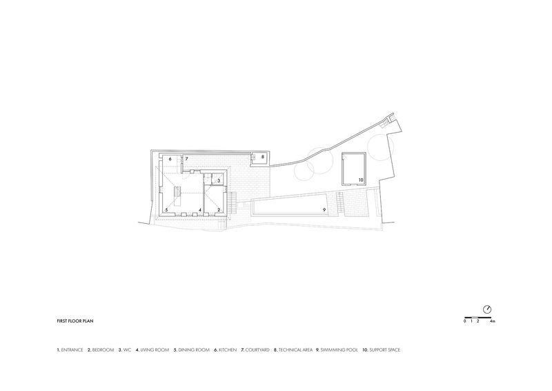 First floor plan drawing showing entrance, bedroom, water closet, living room, dining room and kitchen layout