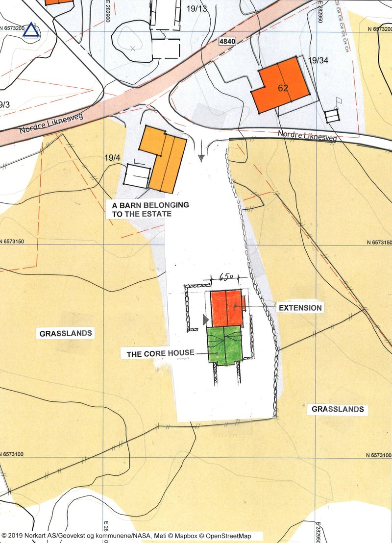 Site plan drawing showing building footprints with existing structure and extension on grassland parcel